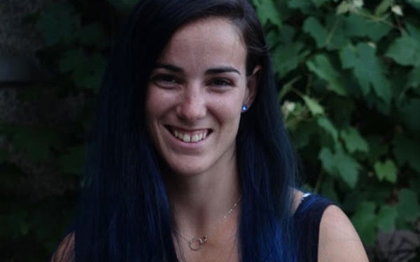 Headshot of Lizzy Schwartz, head rigger and flying trapeze coach.