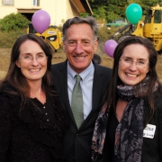 photo of Vermont senator smiling with the founders of NECCA at the new facility construction site.