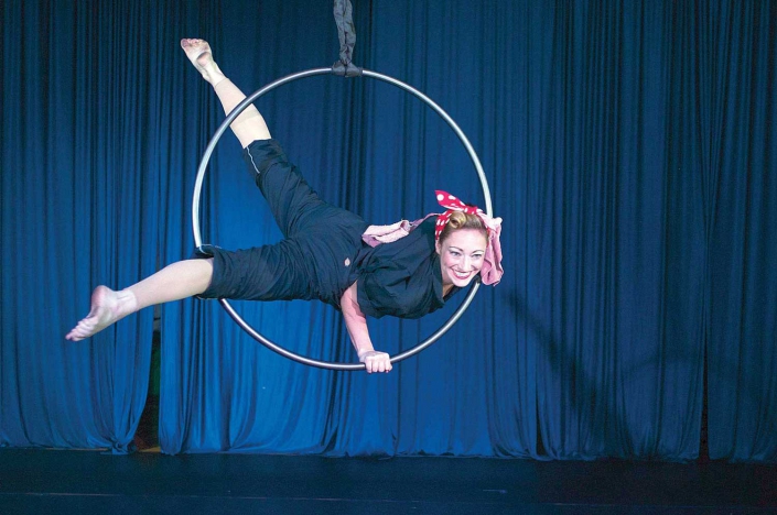 aerial hoop artist performing on stage