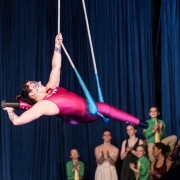 photo of Erin Ball, double leg amputee, performing at NECCA's Flying Nut Christmas show