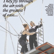 Image of a magazine article with a photo of two people on a flying trapeze rig