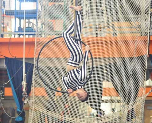 image of kaitlyn lawhorne performing on aerial hoop